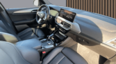 Intérieur BMW X3 xDrive30e – tableau de bord et sièges avant d’un SUV hybride à Narbonne / voiture occasion Narbonne